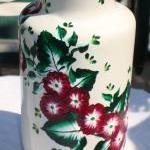 White Vase With Warm Burgundy Flowers