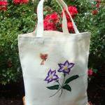 Tote Bag With Violet Flowers And A Red And Yellow..